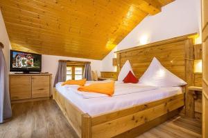 Un pat sau paturi într-o cameră la Haus Benzmühle