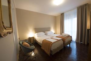 Postel nebo postele na pokoji v ubytování Villa Jasmine B&B