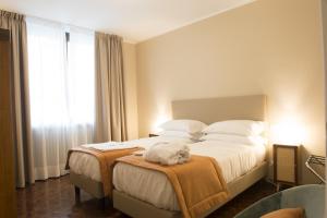 Postel nebo postele na pokoji v ubytování Villa Jasmine B&B