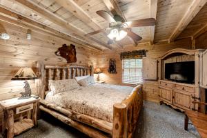 Ένα ή περισσότερα κρεβάτια σε δωμάτιο στο Mystic Falls Lodge +56 φωτογραφίες