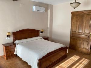 Postel nebo postele na pokoji v ubytování VILLA ZAMORA