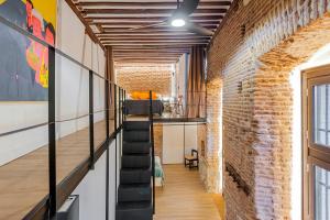 A kitchen or kitchenette at Waou Los Austrias III - Alquiler Corta Duración