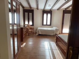 Postel nebo postele na pokoji v ubytování VILLA ZAMORA