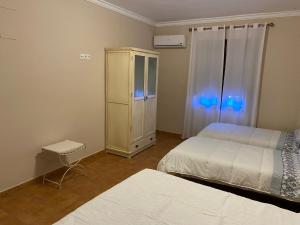 Postel nebo postele na pokoji v ubytování VILLA ZAMORA