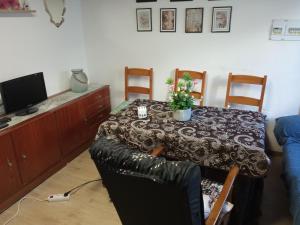 TV a/nebo společenská místnost v ubytování Miguel y Rosa 2