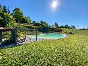 The swimming pool at or close to Buchere Ville