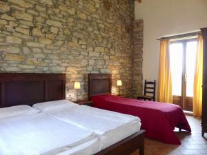 A bed or beds in a room at Buchere Ville