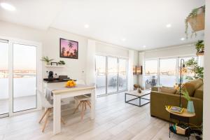 Et opholdsområde på Zen Garden Penthouse