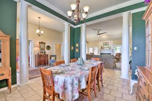 a dining room with a table and chairs at Abilene Home with Backyard and Grill Walk to ACU in Abilene