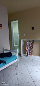 a bedroom with a bunk bed and a mirror at SAXÔNiA HOTEL in Balneário Camboriú +67 photos