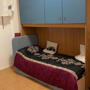 Un pat sau paturi într-o cameră la Casamare Rocca Priora