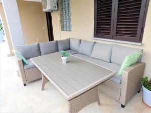 Posezení v ubytování Apartman "Sabine red" with heated pool