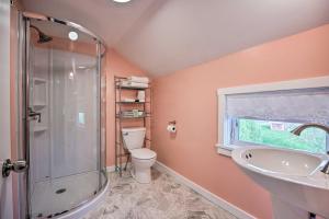 a bathroom with a shower and a sink and a toilet at Rise and Shine Farm in Goshen with BBQ and Fire Pit! in Goshen +20 photos