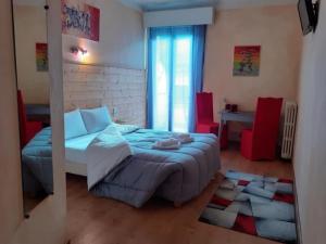 Postel nebo postele na pokoji v ubytování Hotel Bayle + 8 fotografií