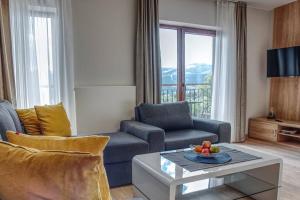 Χώρος καθιστικού στο Apartament z widokiem na góry