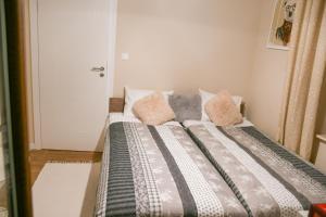 Posteľ alebo postele v izbe v ubytovaní Apartament Homole 4D
