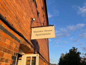 a sign on a building that says marriage house apartments at Stylish Cosy and Bright Apartment - Fantastic Location - Perfect for Business or solo travellers in Bishops Stortford