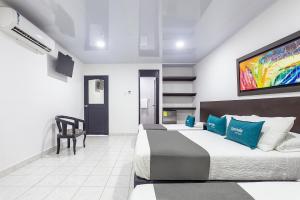 TV a/nebo společenská místnost v ubytování Hotel Ancor