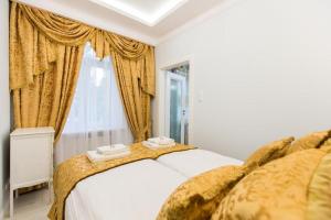 Posteľ alebo postele v izbe v ubytovaní PK Apartments-Lipowa Street-CENTER