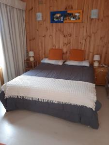 Cama o camas de una habitación en Condominio Don Alberto