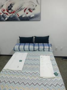 Uma cama ou camas num quarto em Via Venetto Flat Fortaleza Brasile Ceará Meireles