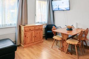 Televiisor ja/või meelelahutuskeskus majutusasutuses Studio cosy au centre de Crans-Montana (1-4 personnes) +20 fotot