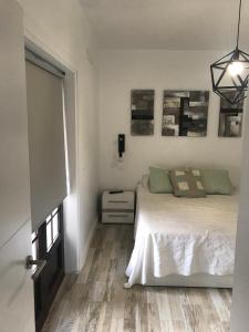 Postel nebo postele na pokoji v ubytování Casa Norah Pc