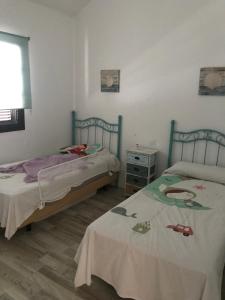 Postel nebo postele na pokoji v ubytování Casa Norah Pc + 28 fotografií