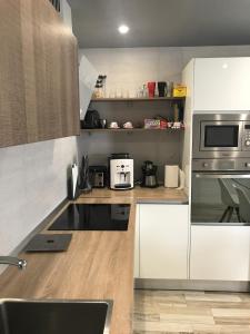 Kuchyň nebo kuchyňský kout v ubytování Casa Norah Pc