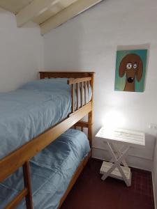 En eller flere senge i et værelse på La Escondida