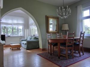 a living room with a table and a couch at Strandstraße 60 Ferienwohnung S12 in Graal-Müritz