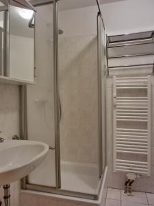 a bathroom with a shower and a sink at Ferienwohnung P3 in Graal-Müritz