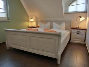 Ένα ή περισσότερα κρεβάτια σε δωμάτιο στο Ferienhaus FH17
