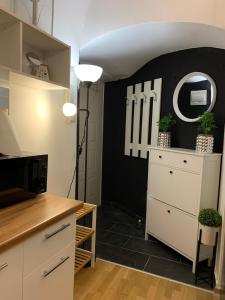 TV i/ili multimedijalni sistem u objektu Apartment Aventus