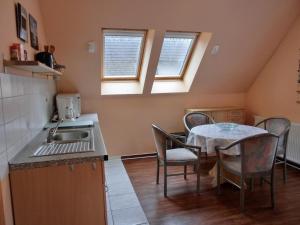 Kuchyň nebo kuchyňský kout v ubytování Ferienwohnung S26 + 4 fotografie