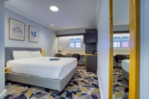 Giường trong phòng chung tại The Palmer Collective +23 ảnh