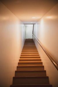 a flight of stairs in a building at Old School Lodge in Montrose