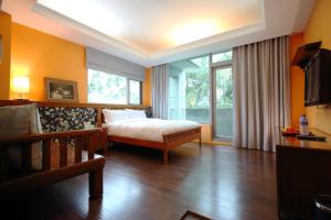 TV a/nebo společenská místnost v ubytování Pretty Sun B&B