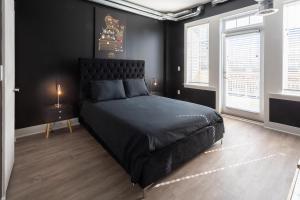 Ліжко або ліжка в номері Louis Vuitton Loft