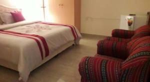 Кровать или кровати в номере Ahlam Musandam Villa