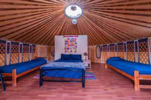 Llit o llits en una habitació de Altos de Quitor , Glamping