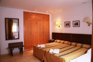 Postel nebo postele na pokoji v ubytování Hotel Tio Felipe