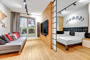 Posteľ alebo postele v izbe v ubytovaní GRANO APARTMENTS Gdańsk Old Town SPA & Wellness - GRANO APARTMENTS Gdańsk Residence SPA & Wellness