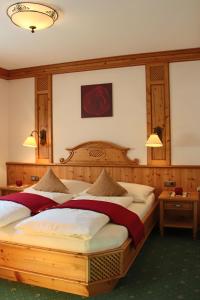 Cama o camas de una habitación en Ferienwohnung Schossleitner - der Wohlfühl-Ansitz am Wolfgangsee mit Weitblick