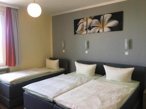 Postel nebo postele na pokoji v ubytování Hotel Sieme