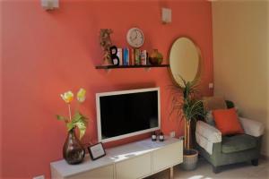 TV a/nebo společenská místnost v ubytování Casa Lagarto