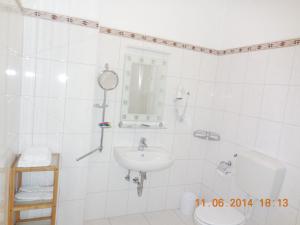 Koupelna v ubytování Hotel Athos