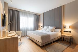 Postel nebo postele na pokoji v ubytování Aparthotel Attica21 As Galeras + 33 fotografií