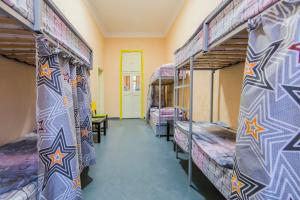 a row of bunk beds in a room at Vorobey Hostel in Kyiv