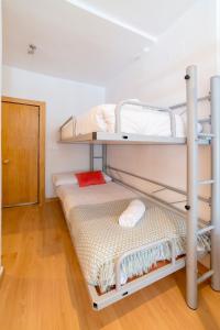 Posteľ alebo postele v izbe v ubytovaní Bed and Snow Apartments